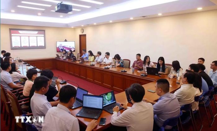 Đảng viên thuộc Đảng bộ Thông tấn xã Việt Nam tham dự Hội nghị trực tuyến tại điểm cầu trụ sở Thông tấn Quốc gia (5 Lý Thường Kiệt, Hà Nội). (Ảnh: Phạm Kiên/TTXVN)