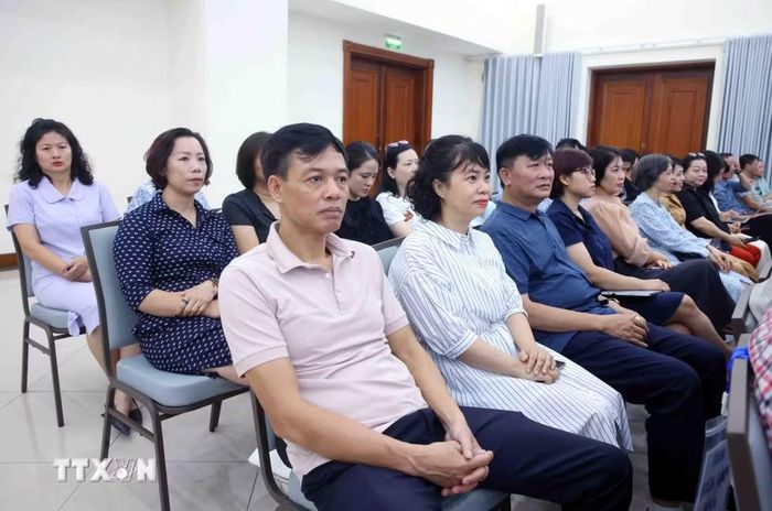 Đảng viên thuộc Đảng bộ Thông tấn xã Việt Nam tham dự Hội nghị trực tuyến tại điểm cầu trụ sở Thông tấn Quốc gia (5 Lý Thường Kiệt, Hà Nội). (Ảnh: Phạm Kiên/TTXVN)