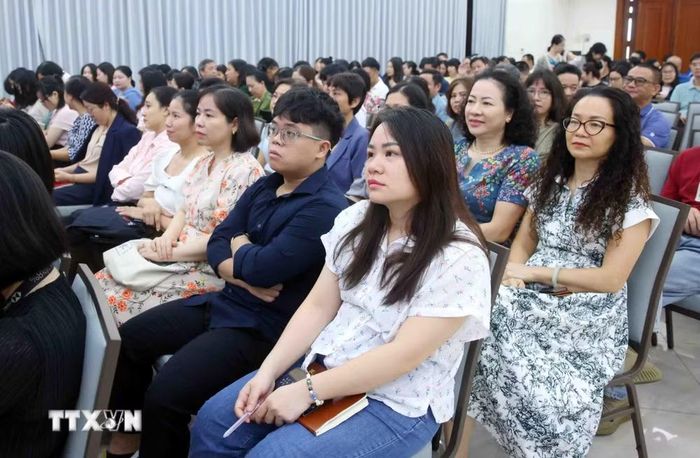Đảng viên thuộc Đảng bộ Thông tấn xã Việt Nam tham dự Hội nghị trực tuyến tại điểm cầu trụ sở Thông tấn Quốc gia (5 Lý Thường Kiệt, Hà Nội). (Ảnh: Phạm Kiên/TTXVN)