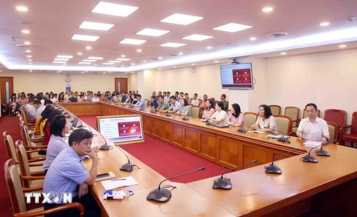 Đảng viên thuộc Đảng bộ Thông tấn xã Việt Nam tham dự Hội nghị trực tuyến tại điểm cầu trụ sở Thông tấn Quốc gia (5 Lý Thường Kiệt, Hà Nội). (Ảnh: Phạm Kiên/TTXVN)