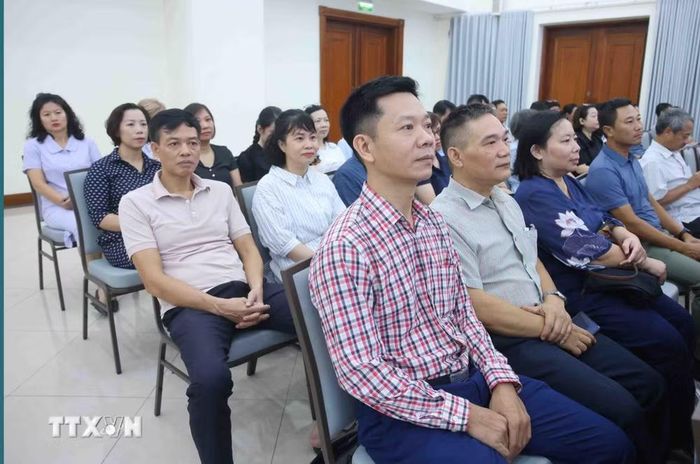 Đảng viên thuộc Đảng bộ Thông tấn xã Việt Nam tham dự Hội nghị trực tuyến tại điểm cầu trụ sở Thông tấn Quốc gia (5 Lý Thường Kiệt, Hà Nội). (Ảnh: Phạm Kiên/TTXVN)