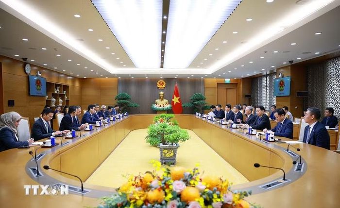 Thủ tướng Lê Minh Hưng tiếp ông Tan Sri Tengku Muhammad Taufik, Chủ tịch kiêm Tổng Giám đốc Tập đoàn Dầu khí Quốc gia Malaysia (PETRONAS). (Ảnh: Dương Giang/TTXVN)