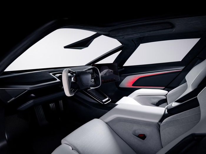 Khoang lái Tesla Roadster với vô lăng kiểu yoke và màn hình trung tâm. Ảnh: Tesla.