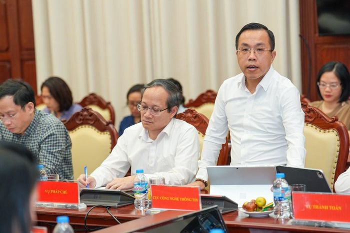 Ông Lê Hoàng Chính Quang, Cục trưởng Cục Công nghệ thông tin (Ngân hàng Nhà nước). Ảnh: Bnews phát