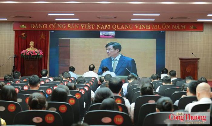 Quang cảnh hội nghị tại điểm cầu Bộ Công Thương. 