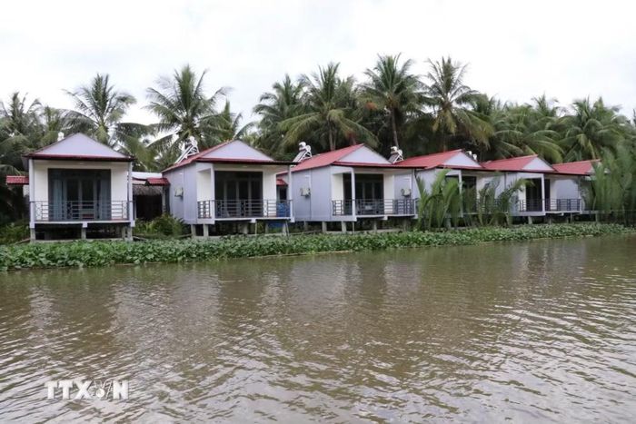 Homestay Quốc Đạt phục vụ khách lưu trú tại Làng du lịch cộng đồng Nhị Hòa, xã Nhị Long. (Ảnh: Thanh Hòa/TTXVN)