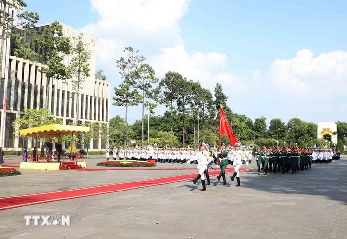 Lễ đón trọng thể Tổng thống Thụy Sĩ Guy Parmelin và Phu nhân Caroline Parmelin thăm chính thức Việt Nam. (Ảnh: Thống Nhất/TTXVN)