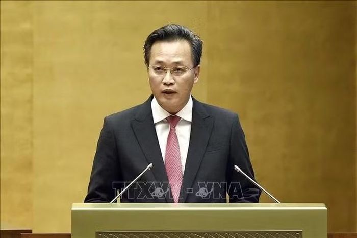 Tổng Kiểm toán Nhà nước Nguyễn Hữu Nghĩa trình bày Báo cáo kiểm toán quyết toán ngân sách nhà nước năm 2025. Ảnh: Doãn Tấn/TTXVN