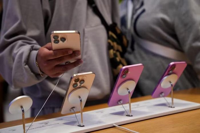 Apple đối mặt vụ kiện tại Mỹ liên quan đến tính năng nhận diện khuôn mặt trong ứng dụng Ảnh. Ảnh: Adam Gray/Reuters.