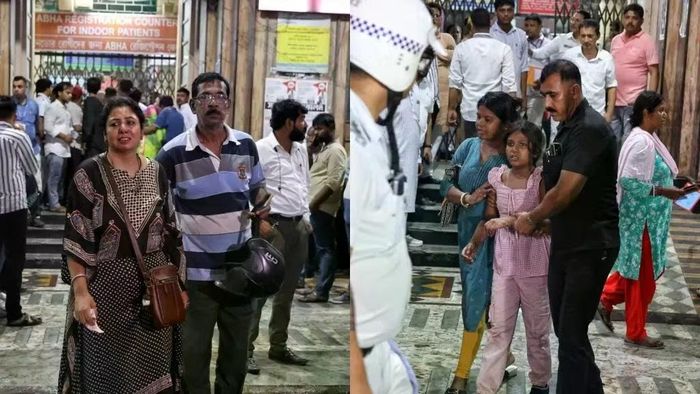 Người thân của các nạn nhân thất thần, đứng bên ngoài bệnh viện Kolkata. Ảnh: Indian Express/Partha Paul