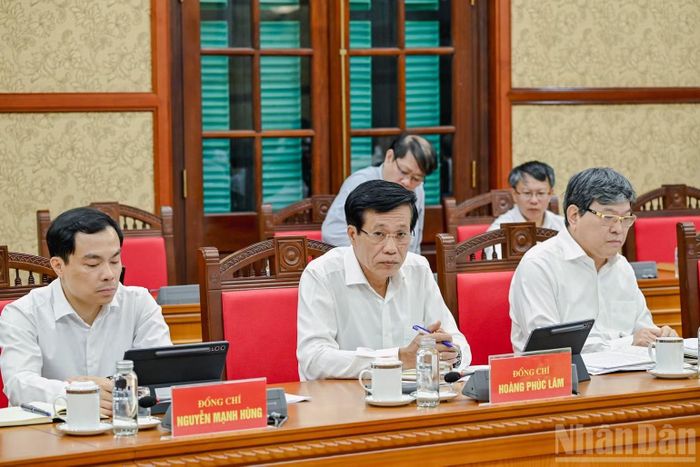 Lãnh đạo Học viện Chính trị quốc gia Hồ Chí Minh dự buổi làm việc. (Ảnh: DUY LINH)