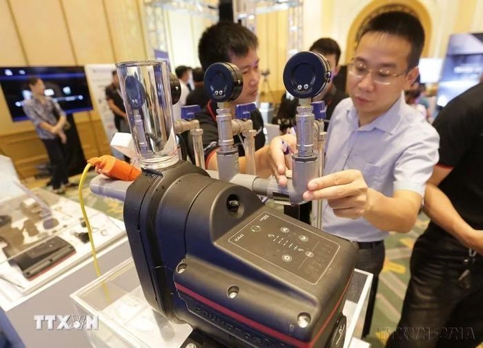 Triển lãm sản phẩm bơm và công nghệ bơm đến từ Đan Mạch (Hà Nội, 2/8/2019). (Ảnh: Trần Việt/TTXVN) ​