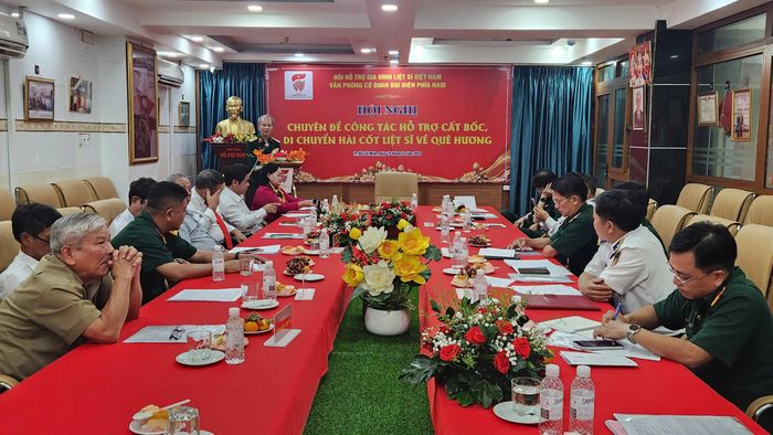 Quang cảnh hội nghị chuyên đề về hỗ trợ cất bốc, di chuyển hài cốt liệt sĩ.