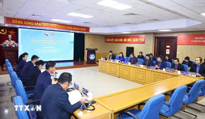 Quang cảnh buổi hội đàm giữa Bí thư thứ nhất Trung ương Đoàn Thanh niên Cộng sản Hồ Chí Minh Bùi Quang Huy hội đàm với Bí thư Trung ương Đoàn Thanh niên Nhân dân Cách mạng Lào Thongly Sisoulith. (Ảnh: Minh Đức/TTXVN)