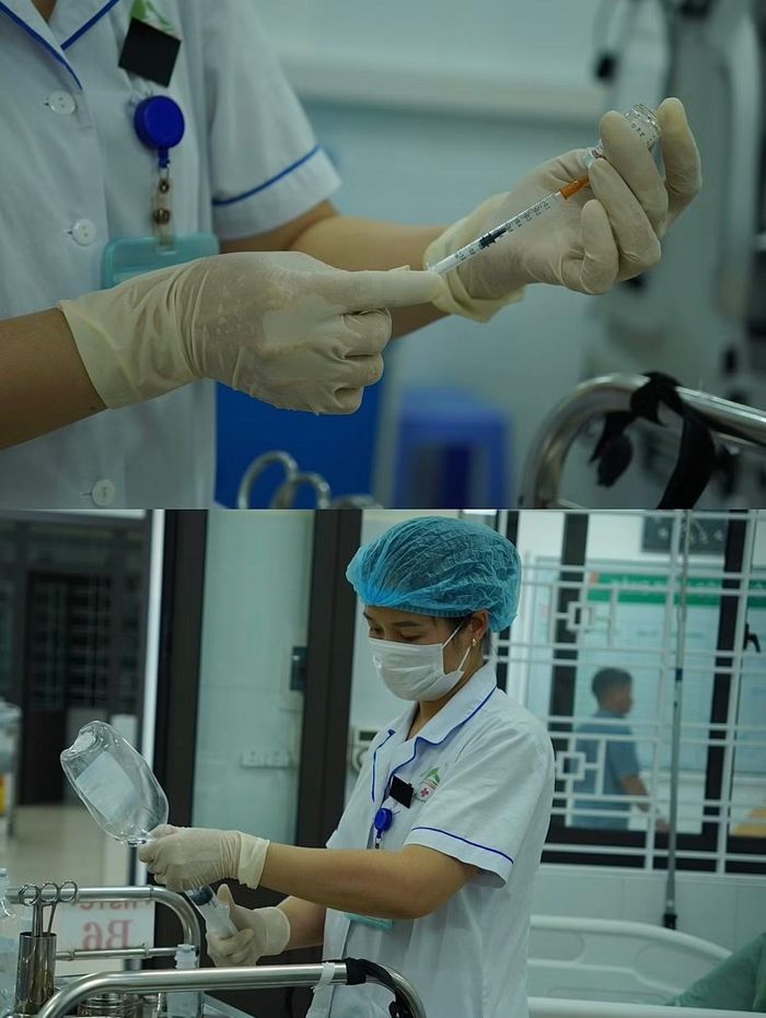 Đôi bàn tay khéo léo của nữ điều dưỡng chuẩn bị từng mũi tiêm. Trong ca trực đêm, áp lực đòi hỏi sự tập trung và chính xác tuyệt đối.