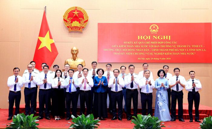 Các đại biểu tham dự Hội nghị sơ kết và ký Quy chế phối hợp công tác giữa Kiểm toán Nhà nước với Ban Thường vụ Thành ủy/Tỉnh ủy, Thường trực HĐND - UBND thành phố Hà Nội và tỉnh Sơn La. Ảnh: Viết Thành