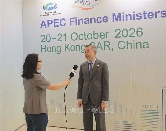 Bộ trưởng Bộ Tài chính Ngô Văn Tuấn trả lời phỏng vấn của TTXVN sau khi bế mạc Hội nghị. Ảnh: Xuân Vịnh/PV TTXVN tại Hong Kong (Trung Quốc).
