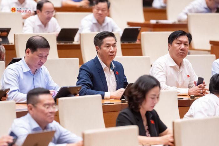 Các Đại biểu Quốc hội nghe các Tờ trình của Chính phủ sáng 21/10 Ảnh: Phạm Thắng