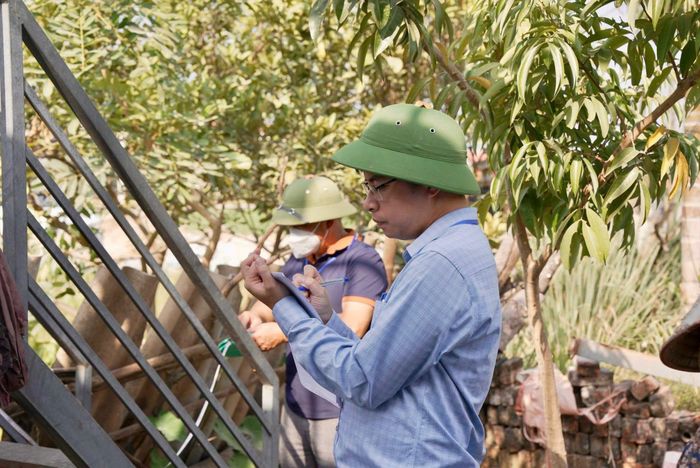 Việc kiểm đếm nhằm xác định đầy đủ, chính xác diện tích đất và tài sản gắn liền với đất trong phạm vi thu hồi. Ảnh: PV