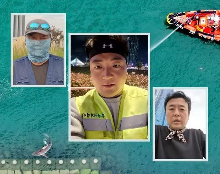 Các YouTuber thay phiên nhau canh chừng con cá mập mắc kẹt trong kênh đào ở Busan, Hàn Quốc. Ảnh: Yonhap