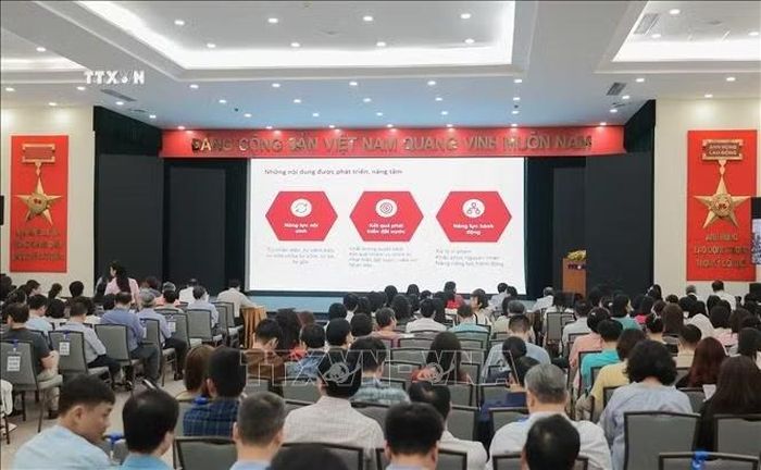 Đảng viên Đảng bộ TTXVN dự hội nghị trực tuyến tại điểm cầu trụ sở Thông tấn quốc gia (số 5, Lý Thường Kiệt). Ảnh: Phan Phương/TTXVN
