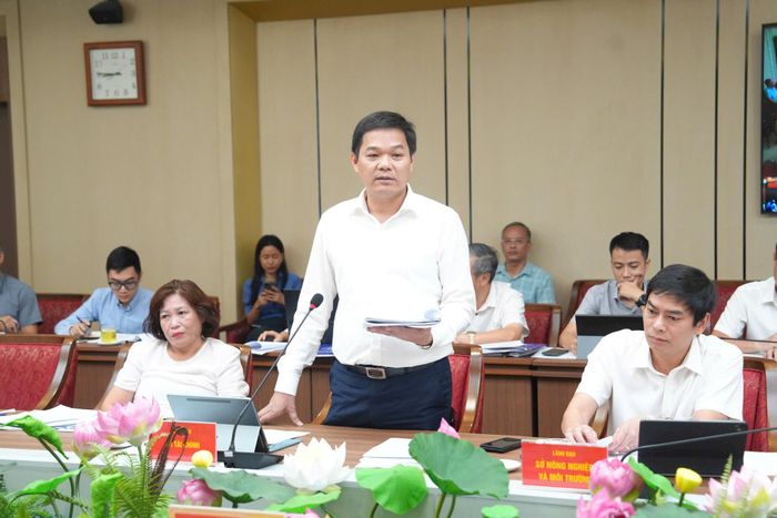 Đại diện lãnh đạo Sở Tài chính Hà Nội báo cáo tại buổi làm việc. Ảnh: Phạm Hùng