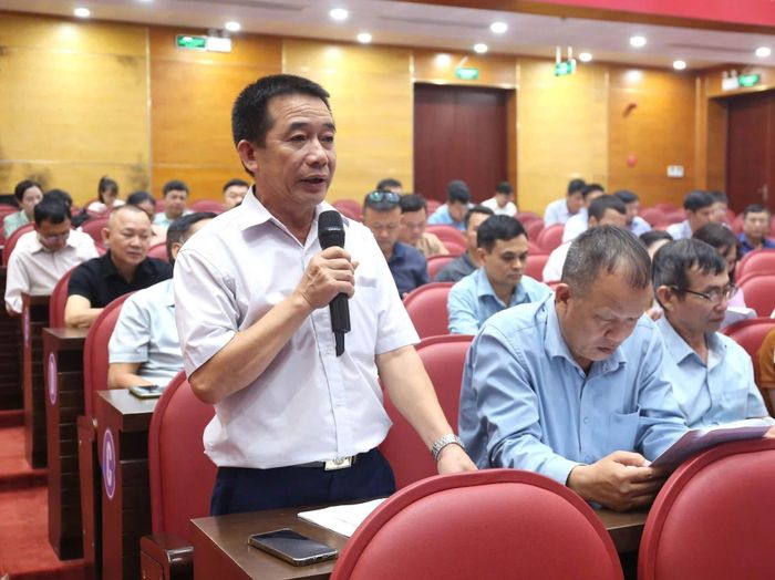 Đại diện thôn cho ý kiến về nội dung Đề án. Ảnh: CTV.