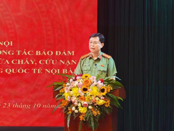 Đại tá Nguyễn Quốc Hùng, Trưởng phòng An ninh nội địa, CATP Hà Nội trình bày quy chế phối hợp mới