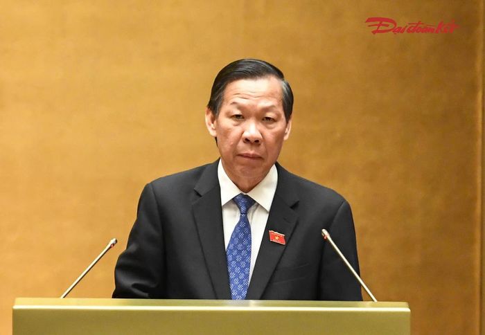 Ông Phan Văn Mãi báo cáo trước Quốc hội (Ảnh: Quang Vinh)
