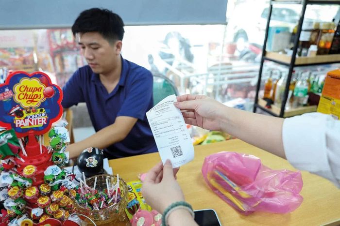 Thủ tục hành chính đơn giản là động lực để hộ kinh doanh chuyển đổi thành doanh nghiệp. Ảnh: Đức Thanh