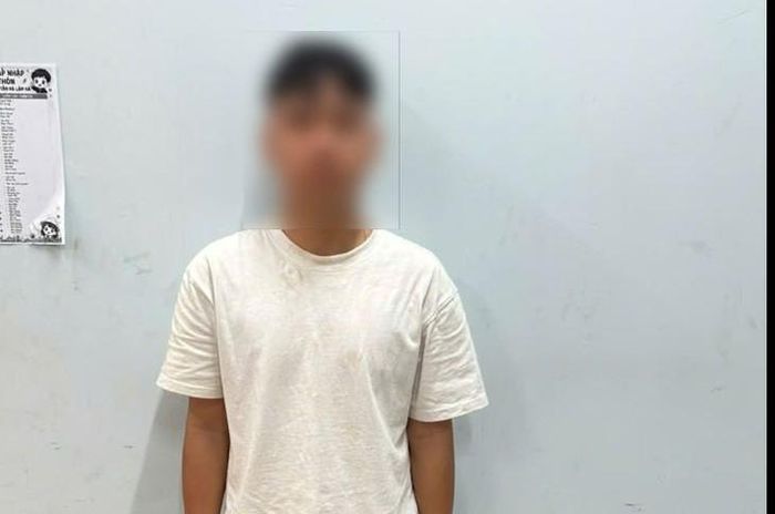 N.Đ.T. khi làm việc tại cơ quan công an. Ảnh: CALĐ.