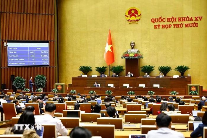 Quốc hội biểu quyết thông qua Luật sửa đổi, bổ sung một số điều của Luật Điều ước quốc tế. (Ảnh: Doãn Tấn/TTXVN)