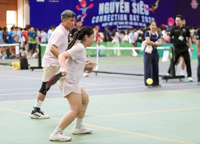 Điểm nhấn đặc biệt của sự kiện là sự tham gia của đông đảo phụ huynh học sinh. (Ảnh: Vietnam+)