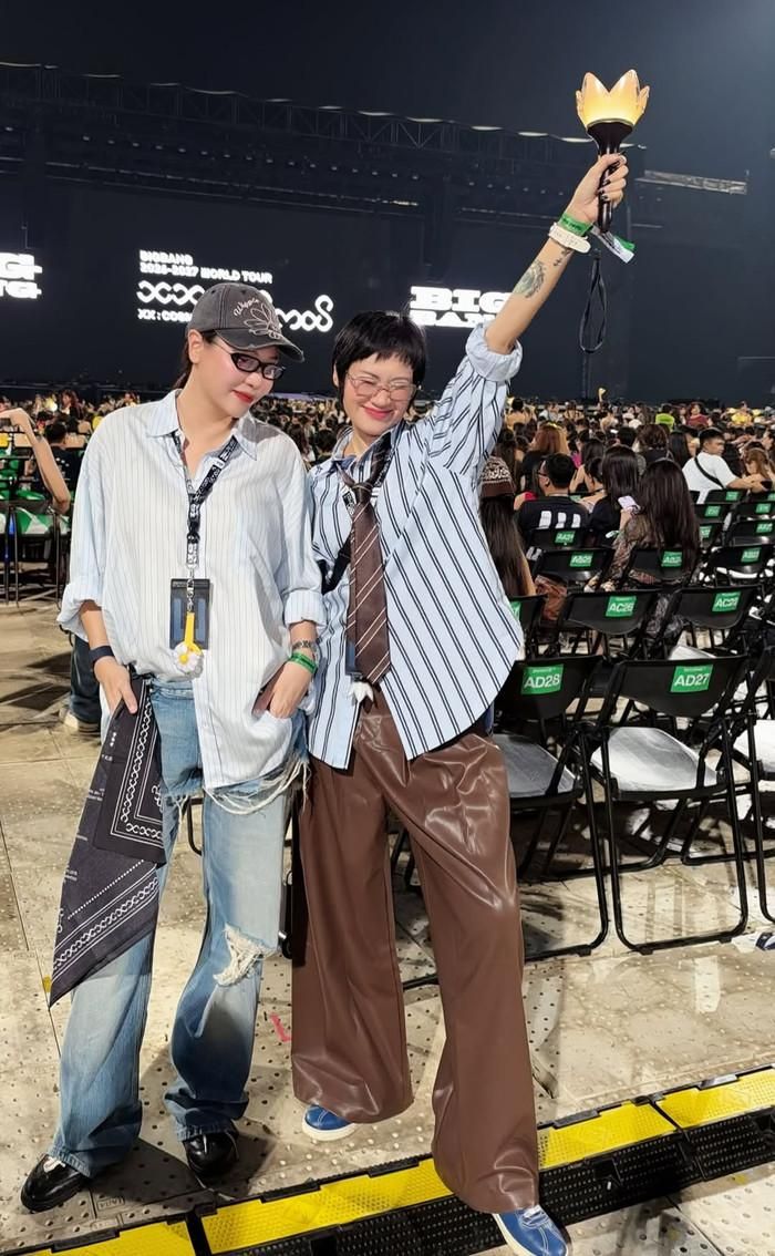 Pông Chuẩn và Đàm Thu Trang đi xem concert BIGBANG ngày thứ hai.