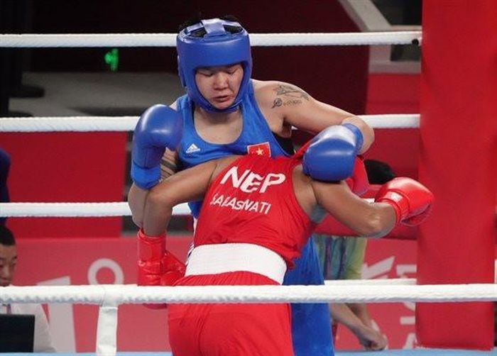 Võ sĩ Lưu Diễm Quỳnh thi đấu tại ASIAD 19. Ảnh: Bùi Lượng