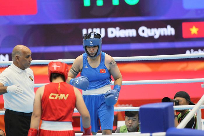 Võ sĩ Lưu Diễm Quỳnh trong trận chung kết hạng 75kg nữ tại ASIAD 20. Ảnh: Bùi Lượng