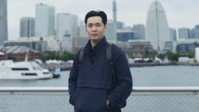 Quang Vinh tại khu vực cảng Minato Mirai, Yokohama (Nhật Bản), nơi anh đang sinh sống và theo học thạc sĩ, với học bổng MEXT.