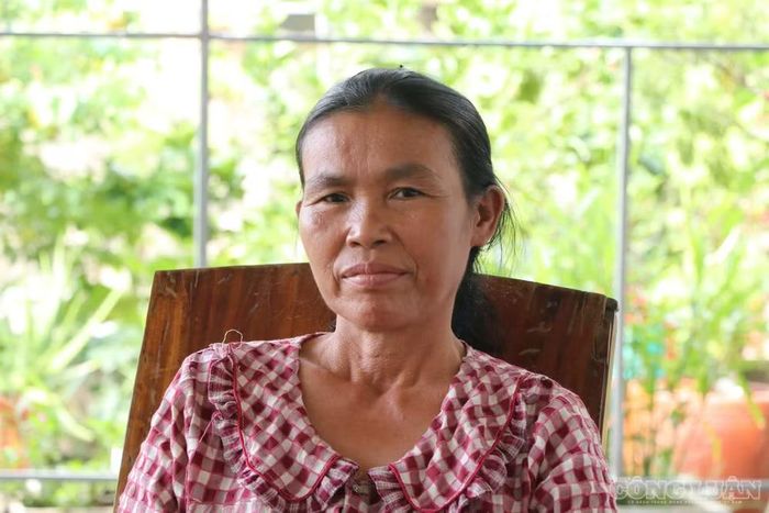 Dù không có công sinh nhưng nhiều năm qua, bà Thủy lặng lẽ chăm các con riêng của chồng. Ảnh: Kim Long