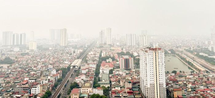 Lớp sương mờ bao phủ nhiều khu vực Hà Nội sáng 26/10