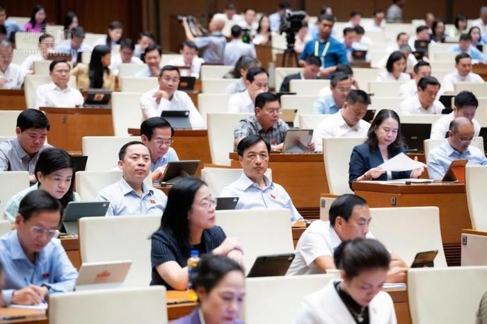 Các đại biểu Quốc hội tham dự phiên họp sáng 26/10.