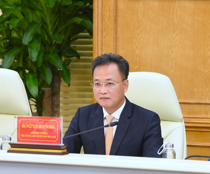 Tổng Kiểm toán nhà nước Nguyễn Hữu Nghĩa đề nghị hai cơ quan tăng cường quan hệ hợp tác, tiến tới ký kết biên bản hợp tác. Ảnh: Như Ý