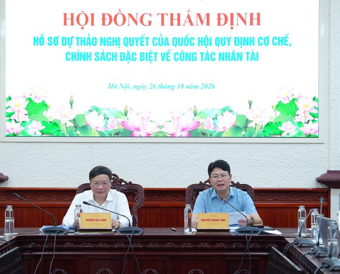 Thứ trưởng Bộ Tư pháp Nguyễn Thanh Tịnh, Thứ trưởng Bộ Nội vụ Trương Hải Long tại cuộc họp. Ảnh: H. DUNG