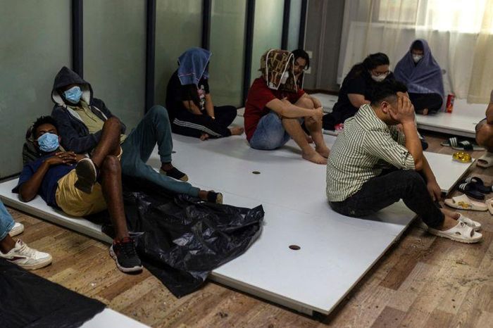 Một nhóm người làm việc trong các trung tâm lừa đảo ở Shwe Kokko, Myanmar bị bắt giữ