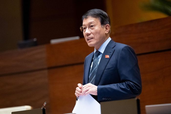 Bộ trưởng Bộ Công an Lương Tam Quang giải trình về nội dung các đại biểu quan tâm. Ảnh: Phạm Thắng