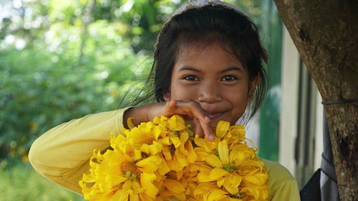 Thiên nhiên hùng vĩ cùng với bình dị của cao nguyên đọng lại trên đôi mắt, trên làn da rám nắng của những đứa trẻ ở làng Ia Gri. 