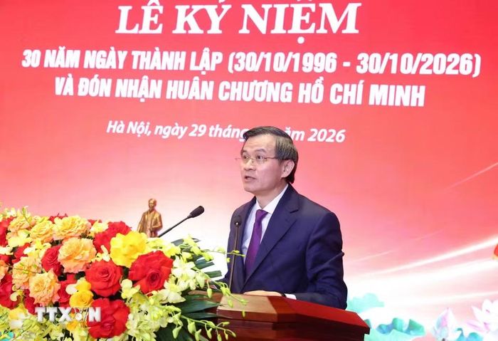 Đồng chí Đoàn Minh Huấn, Ủy viên Bộ Chính trị, Giám đốc Học viện Chính trị quốc gia Hồ Chí Minh, Phó Chủ tịch Thường trực Hội đồng Lý luận Trung ương phát biểu. (Ảnh: Văn Điệp/TTXVN)
