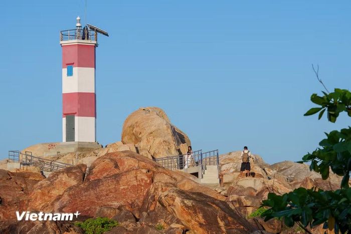 Vẻ đẹp độc đáo của Gành Đèn lúc hoàng hôn. (Ảnh: Thanh Phong/Vietnam+)