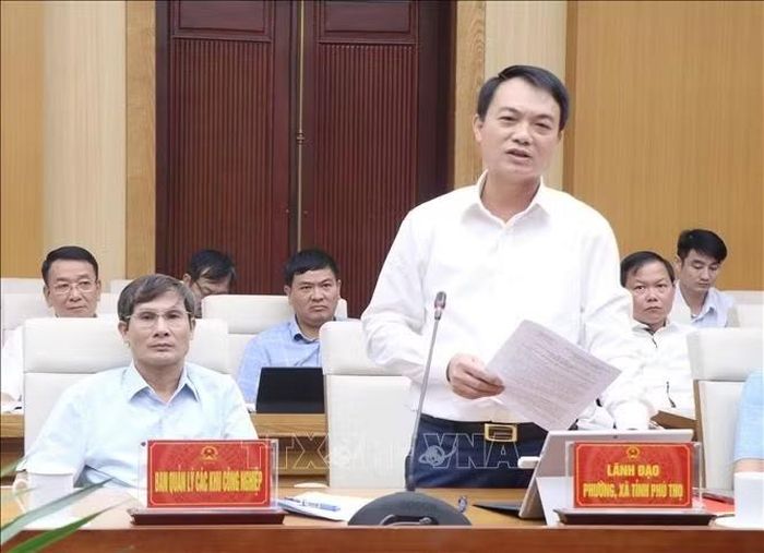 Ông Đỗ Quốc Hà, Chủ tịch UBND xã Dân Chủ, phát biểu tại Hội nghị.