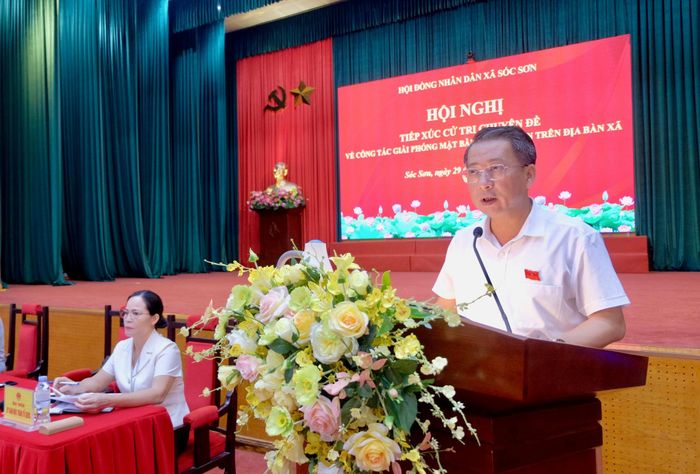 Phó Bí thư Thường trực Đảng ủy, Chủ tịch HĐND xã Sóc Sơn Vương Nguyên Minh phát biểu. Ảnh: Tùng Nguyễn.