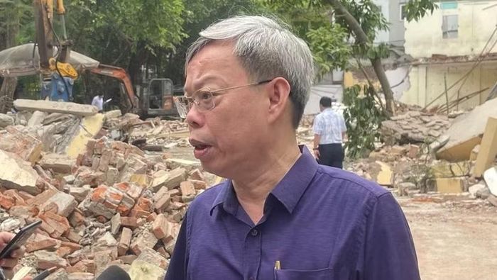 Chủ tịch UBND phường Thanh Xuân Đỗ Quang Dương trả lời phỏng vấn báo chí tại cuộc bàn giao mặt bằng cho Ban Công trình giao thông thành phố